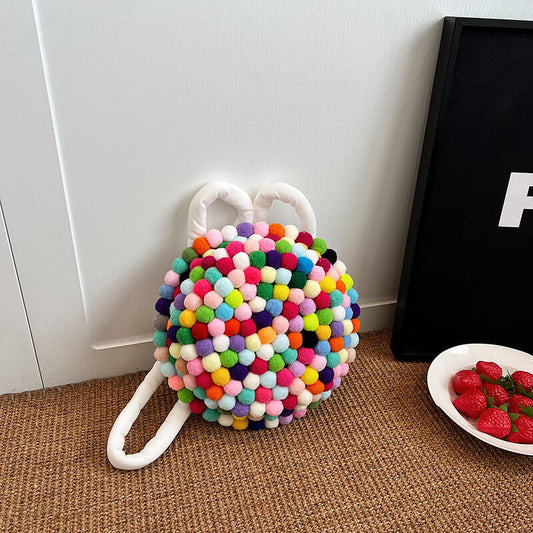 Cute gradient rainbow coloured fur ball round bag